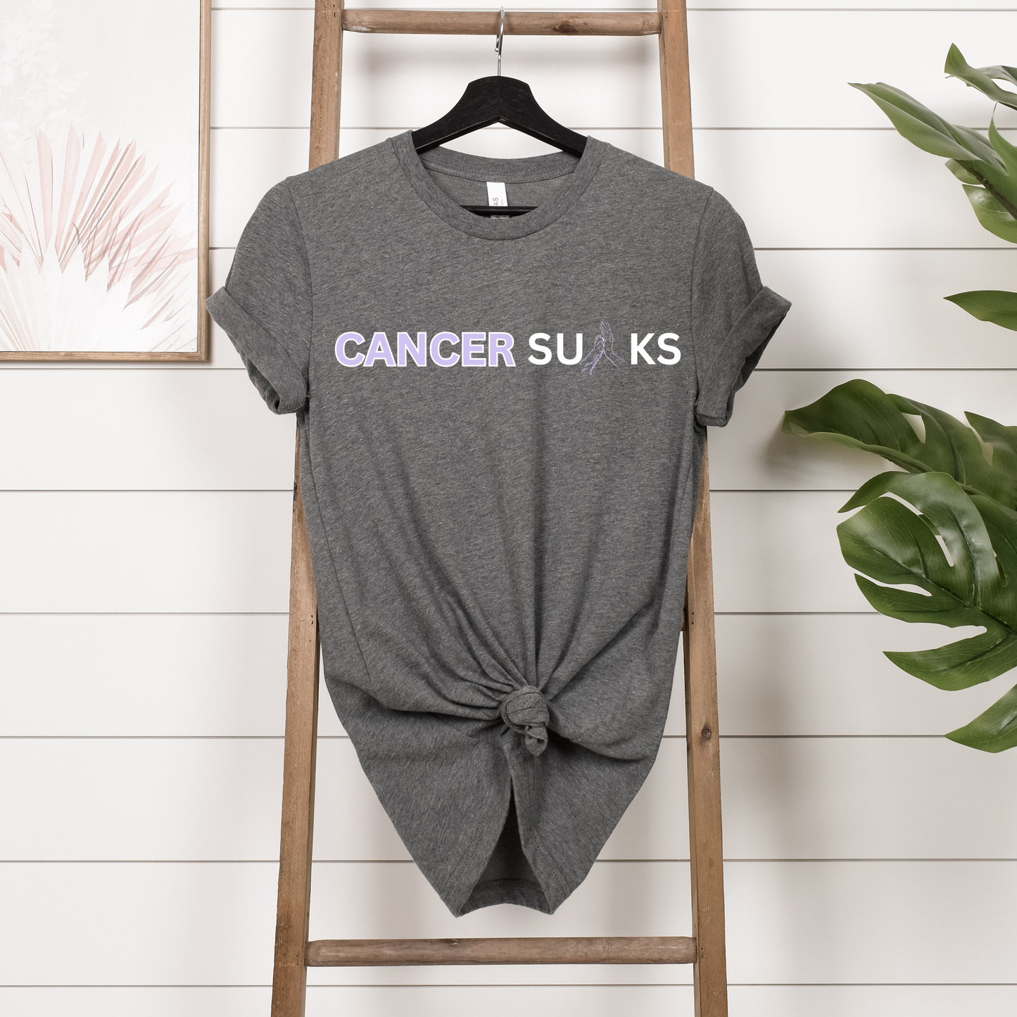 Camisetas con el mensaje “El cáncer apesta”